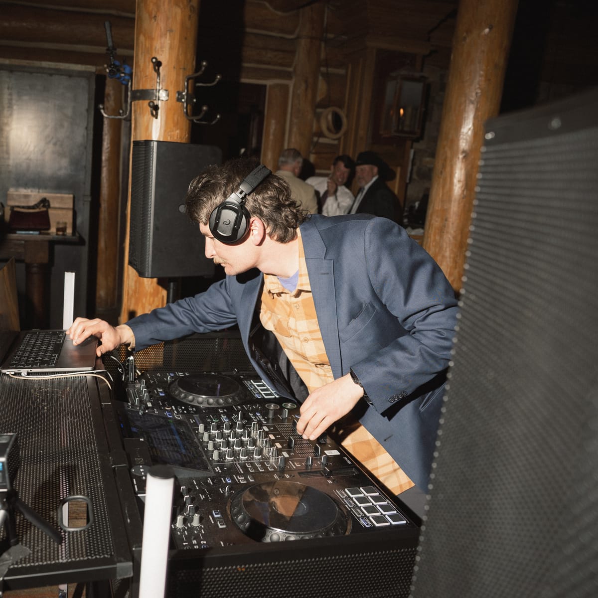 Hank at the decks with guests dancing